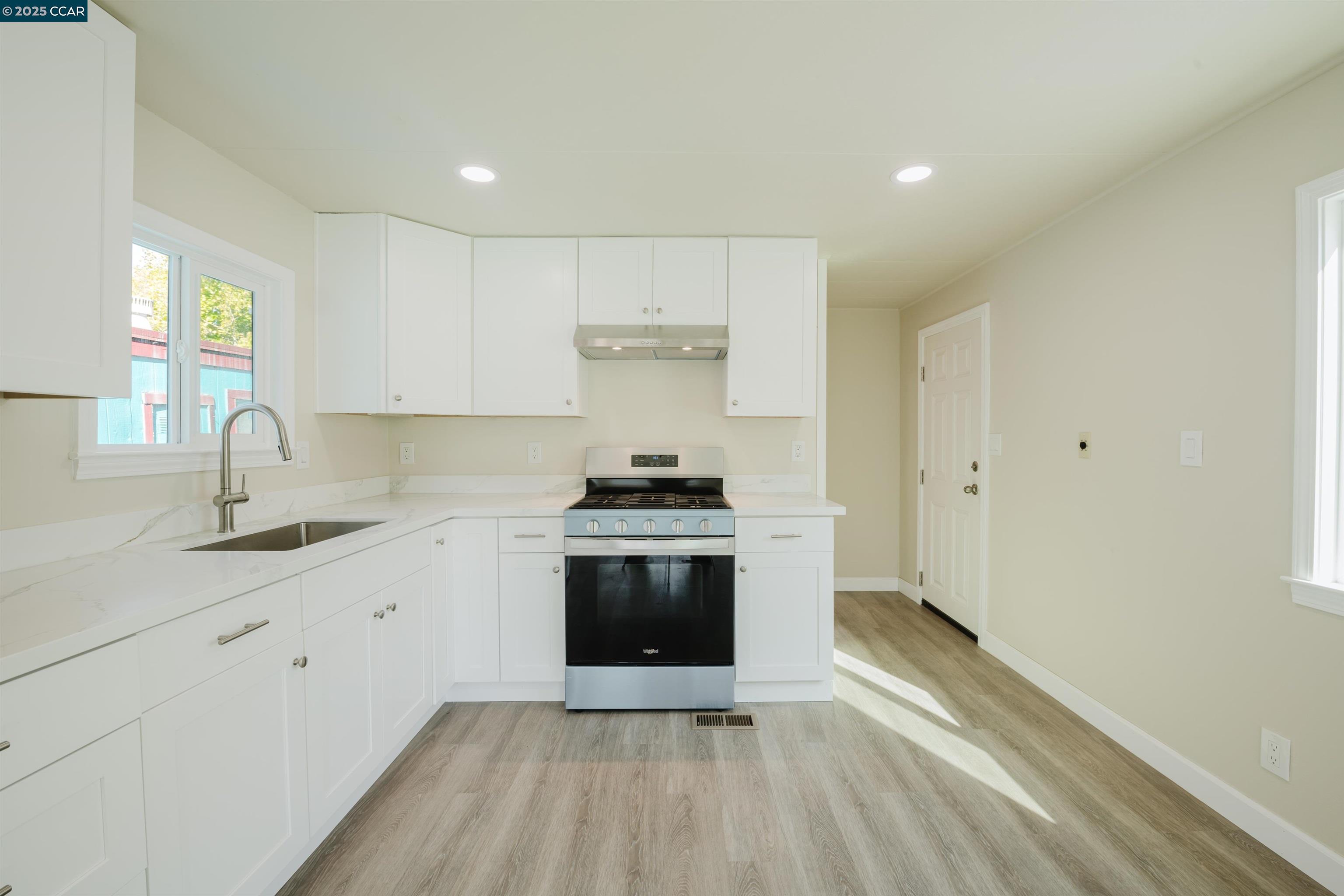 2990 San Pablo Dam Road, Unit 2 San Pablo, CA 94803 - Photo 9 of 41 a kitchen with a sink cabinets and stainless steel appliances