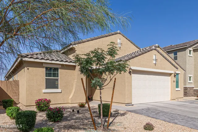 a view of room with furniture and wooden floor