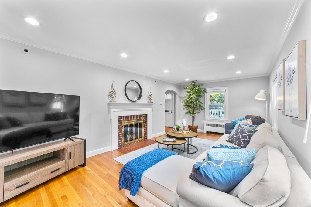 8 Parker Road Needham, MA 02494 - Photo 11 of 28 a living room with furniture and a flat screen tv