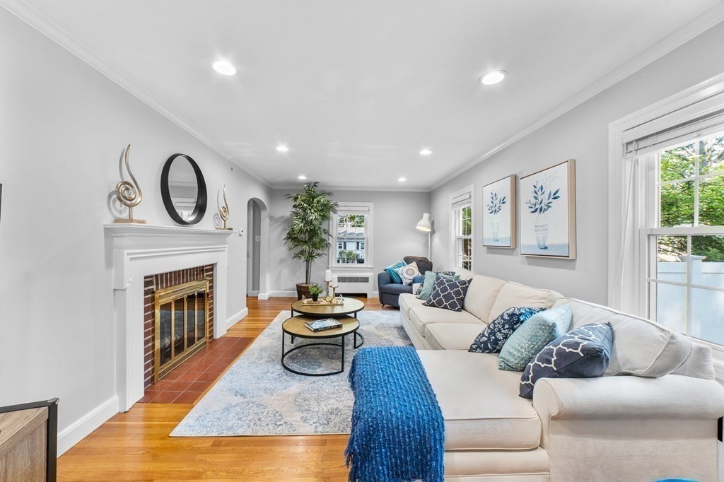8 Parker Road Needham, MA 02494 - Photo 12 of 28 a living room with furniture and a fireplace