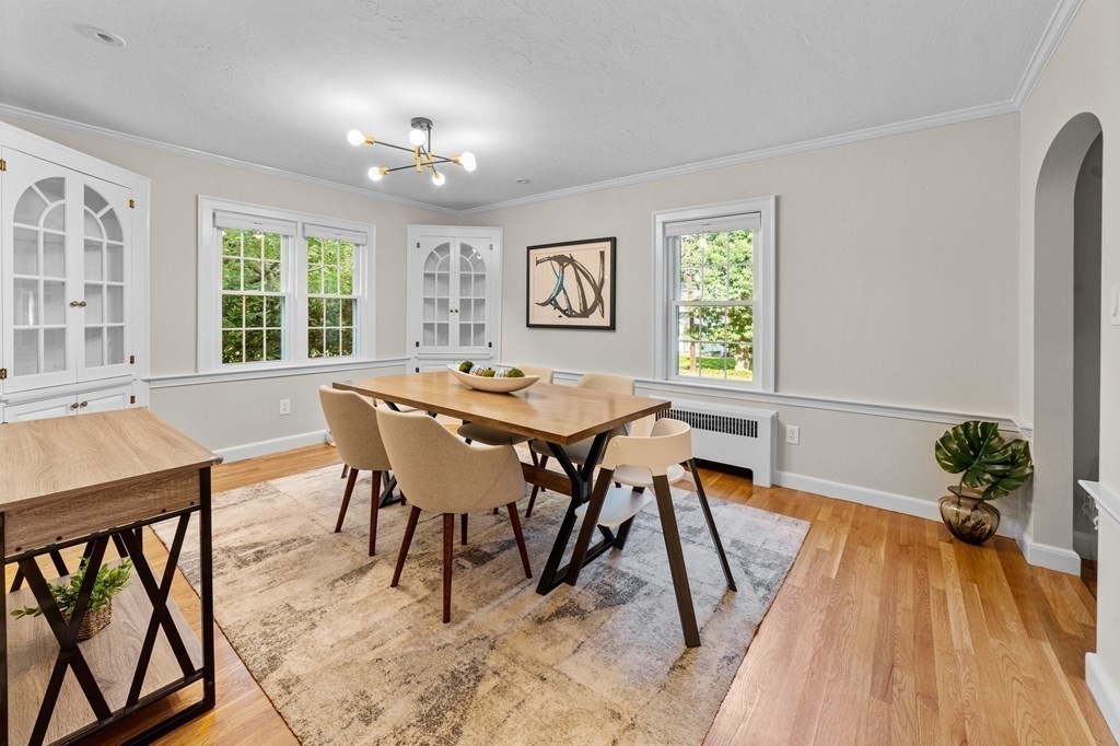 8 Parker Road Needham, MA 02494 - Photo 13 of 28 a view of a dining room with furniture window and wooden floor