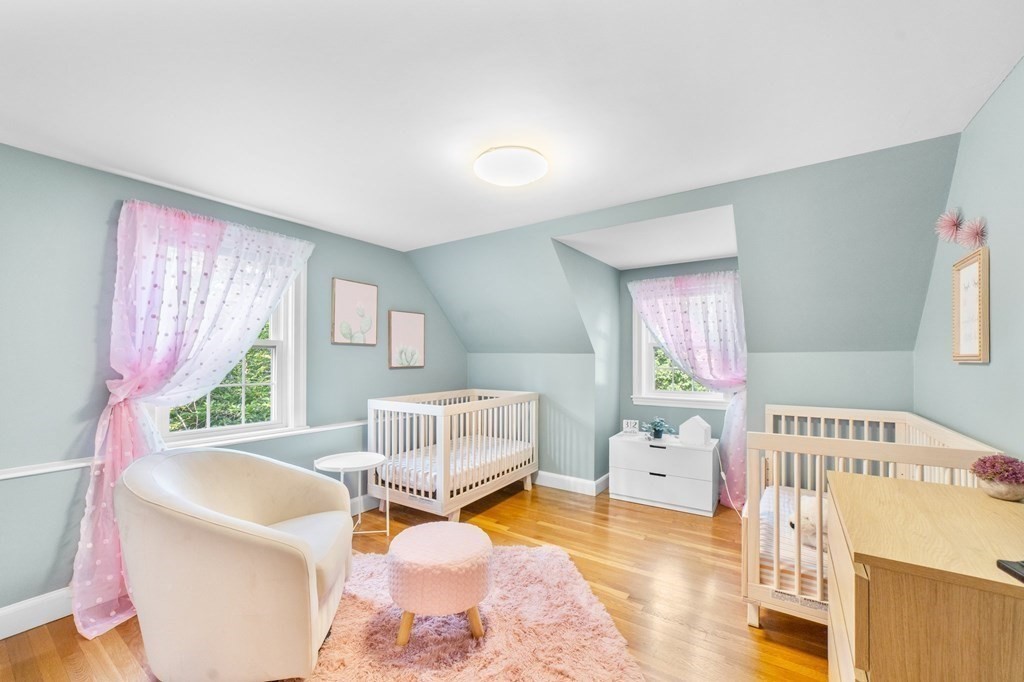 8 Parker Road Needham, MA 02494 - Photo 18 of 28 a bedroom with a bed and a window