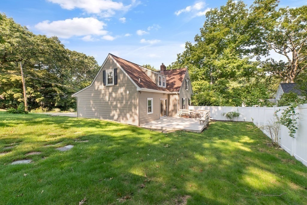 8 Parker Road Needham, MA 02494 - Photo 26 of 28 a view of a house with a yard and sitting area
