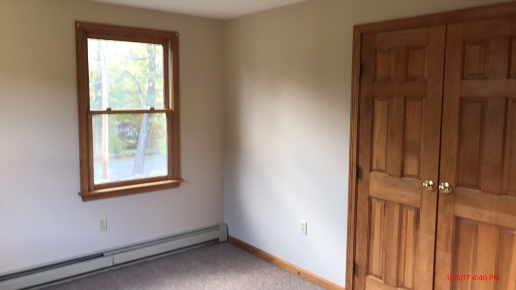 102 Adams Road Grafton, MA 01536 - Photo 16 of 23 an empty room with windows