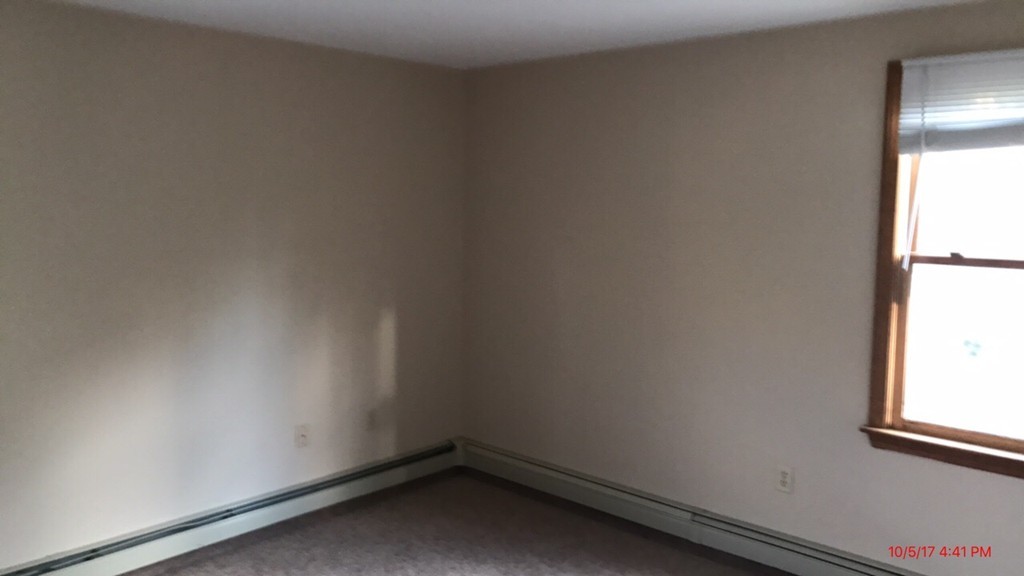 102 Adams Road Grafton, MA 01536 - Photo 18 of 23 a small space with a window
