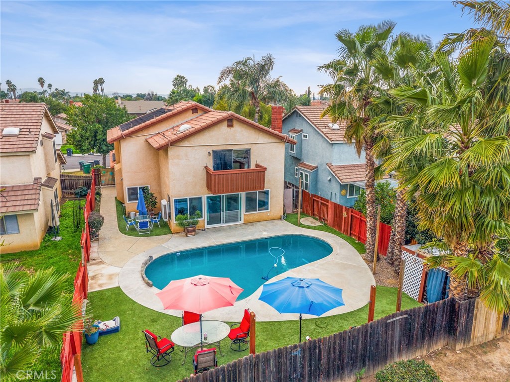 16398 Heather Glen Road Moreno Valley, CA 92551 - Photo 61 of 74 an aerial view of a house with swimming pool outdoor seating