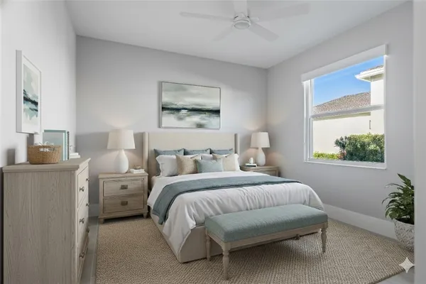 a bedroom with bed and a window