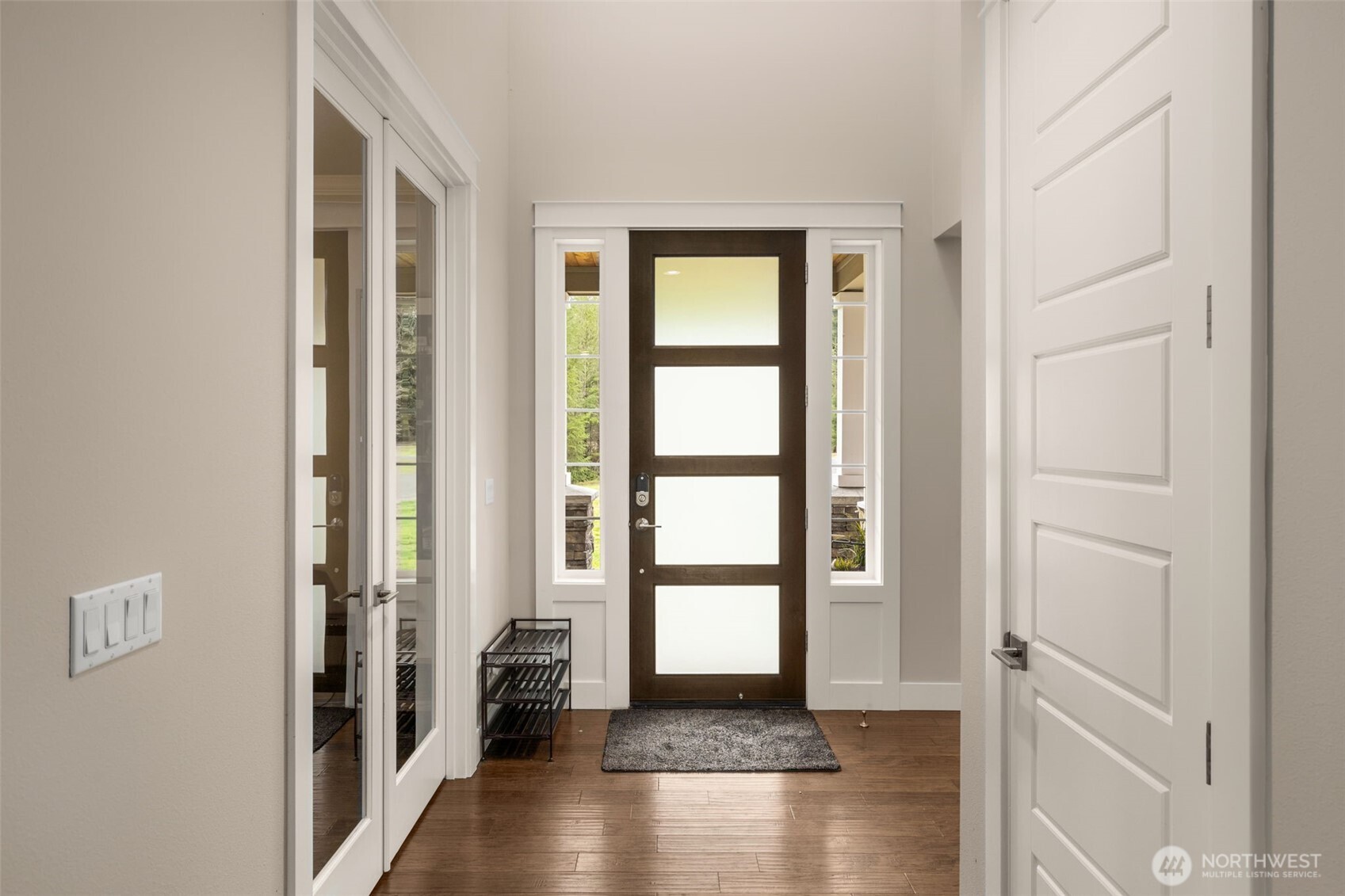 10219 Kelly Road Northeast Carnation, WA 98014 - Photo 5 of 38 a view of an entryway with wooden floor