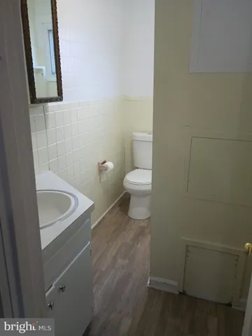 a bathroom with a toilet and a sink