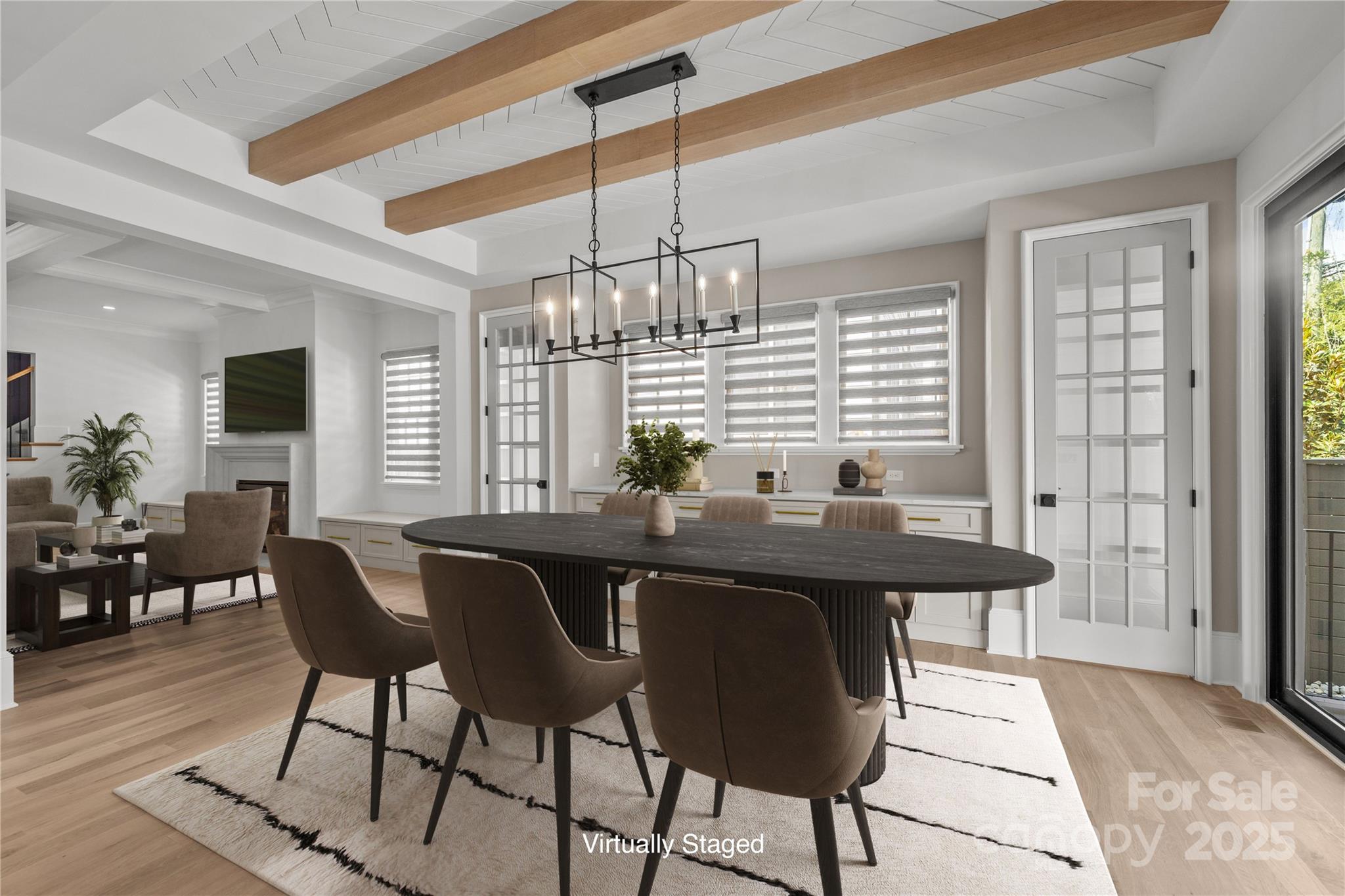 1233 Reece Road Charlotte, NC 28209 - Photo 13 of 48 a kitchen with a table chairs and wooden floor