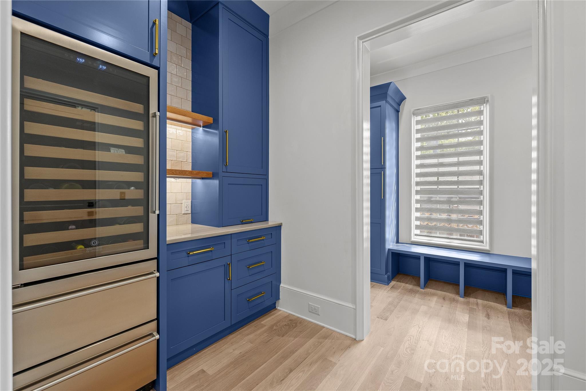 1233 Reece Road Charlotte, NC 28209 - Photo 17 of 48 a view of a hallway with closet and window