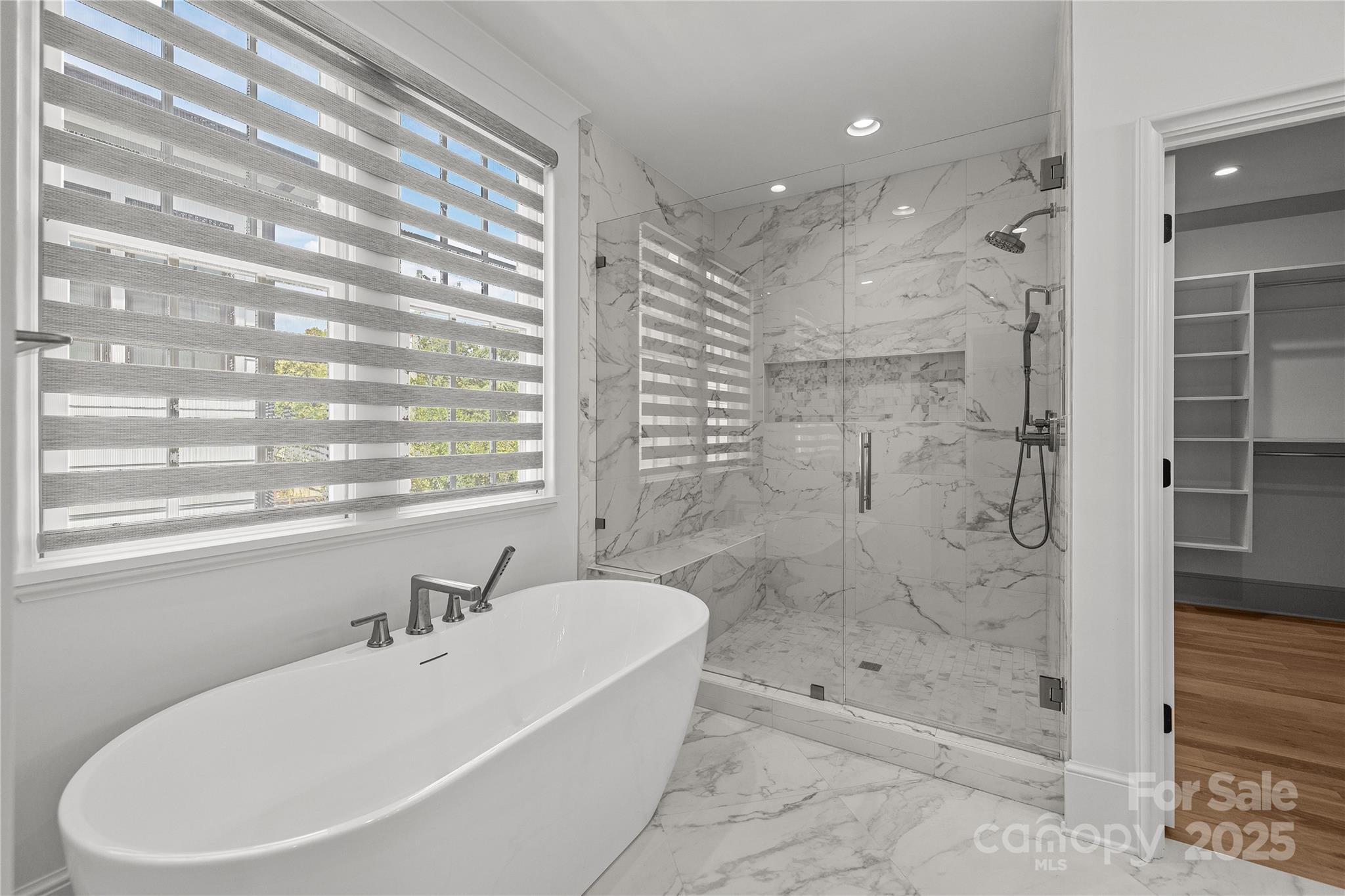 1233 Reece Road Charlotte, NC 28209 - Photo 22 of 48 a bathroom with a bathtub and a shower