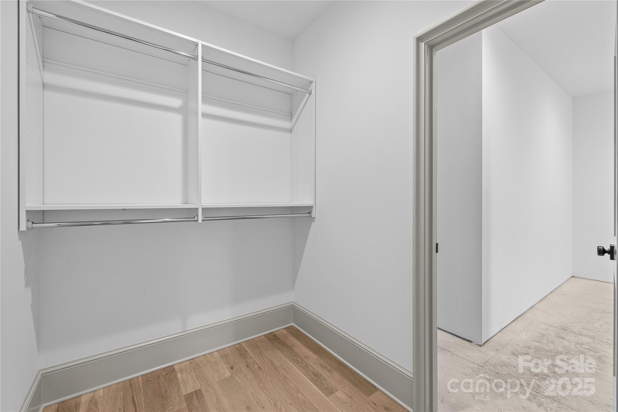 1233 Reece Road Charlotte, NC 28209 - Photo 26 of 48 a view of an empty walk in closet
