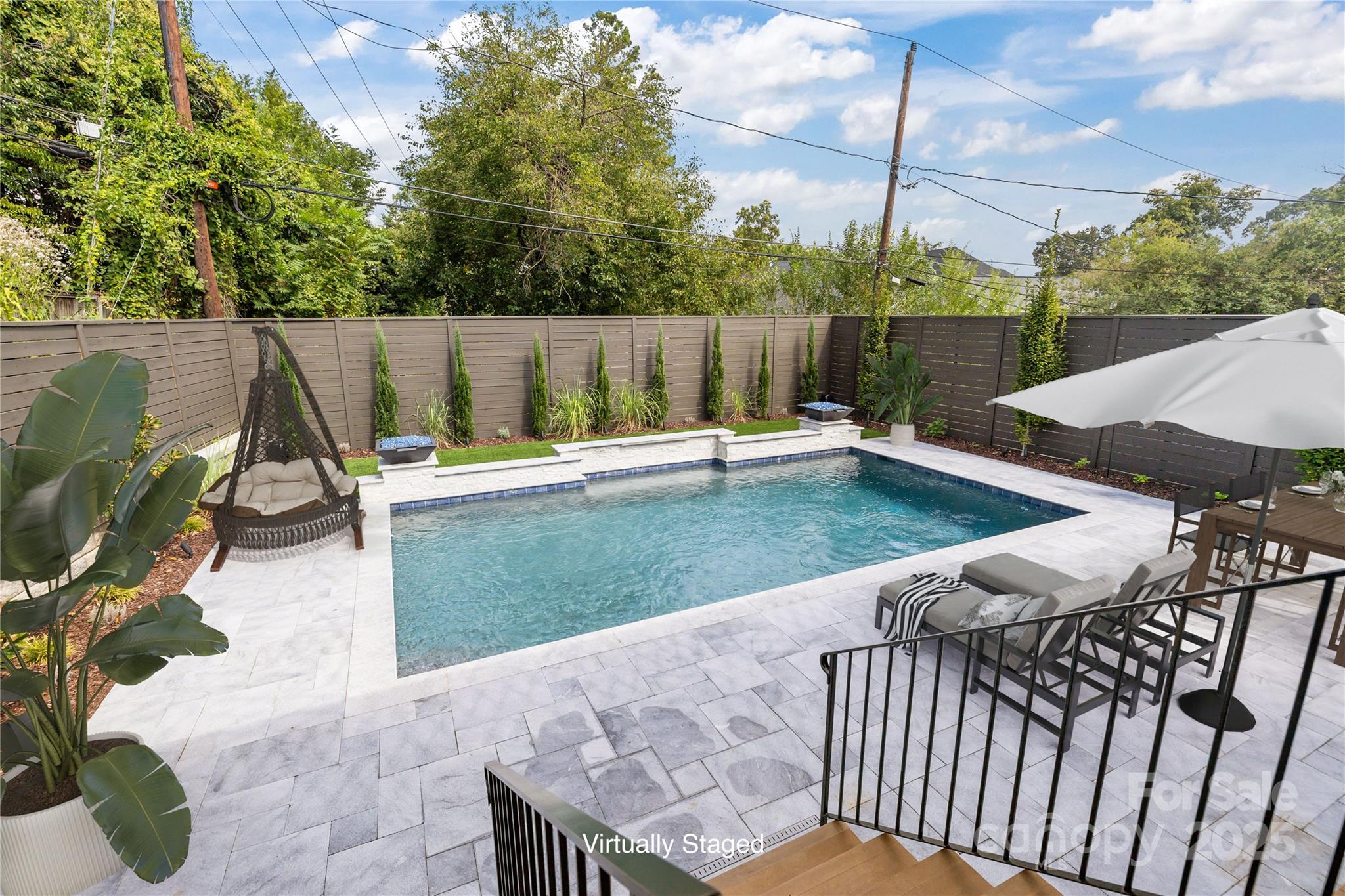 1233 Reece Road Charlotte, NC 28209 - Photo 41 of 48 a view of a backyard with sitting area