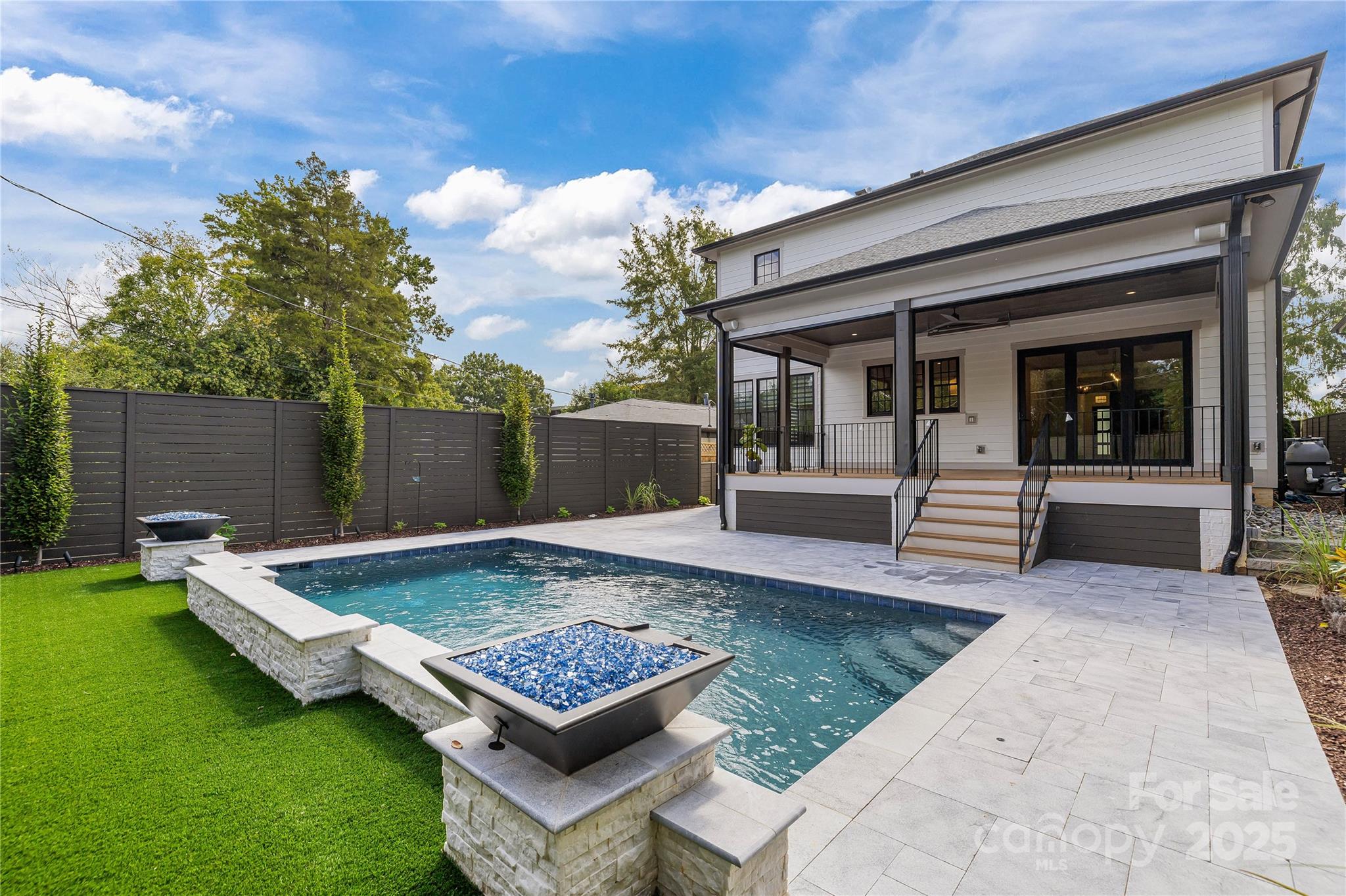 1233 Reece Road Charlotte, NC 28209 - Photo 42 of 48 a view of a backyard with a patio