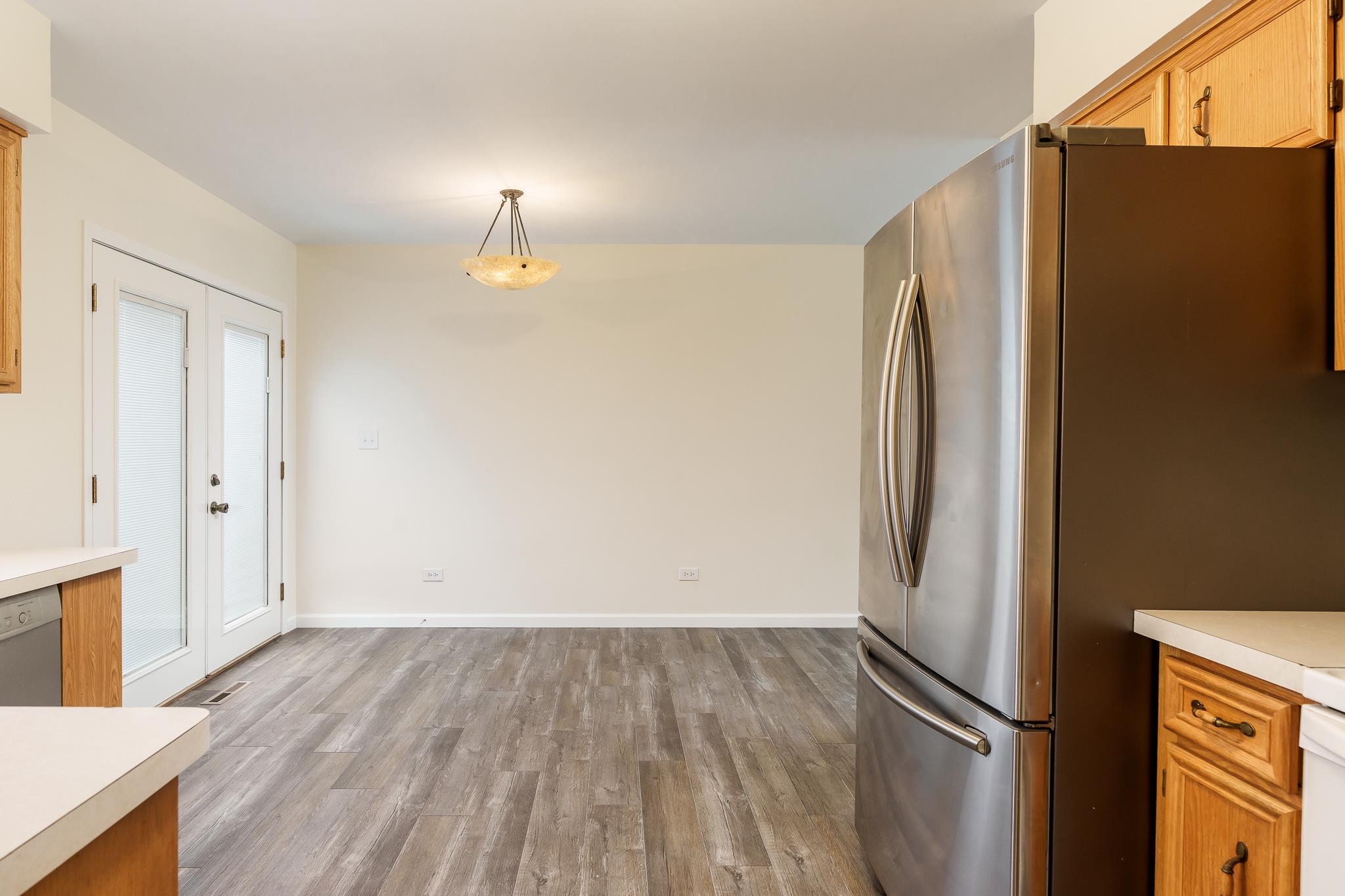 338 Northway Park Road, Unit 6 Machesney Park, IL 61115 - Photo 20 of 38 a view of empty room with wooden floor