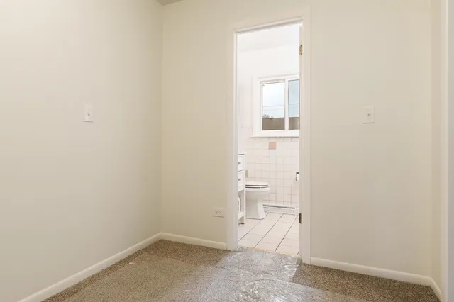 a bathroom with a toilet