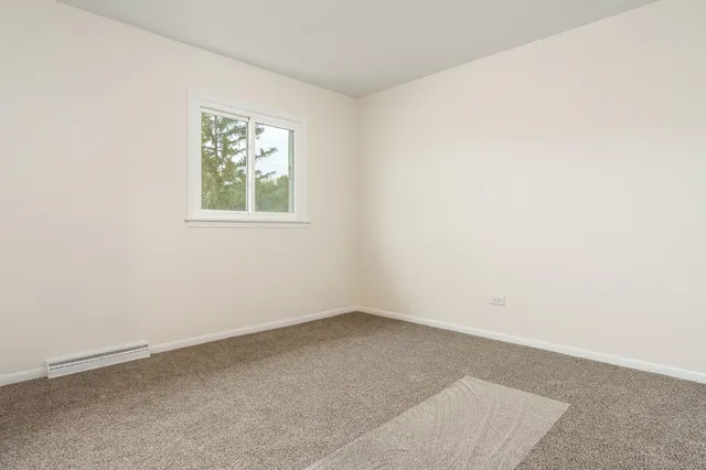 an empty room with a window