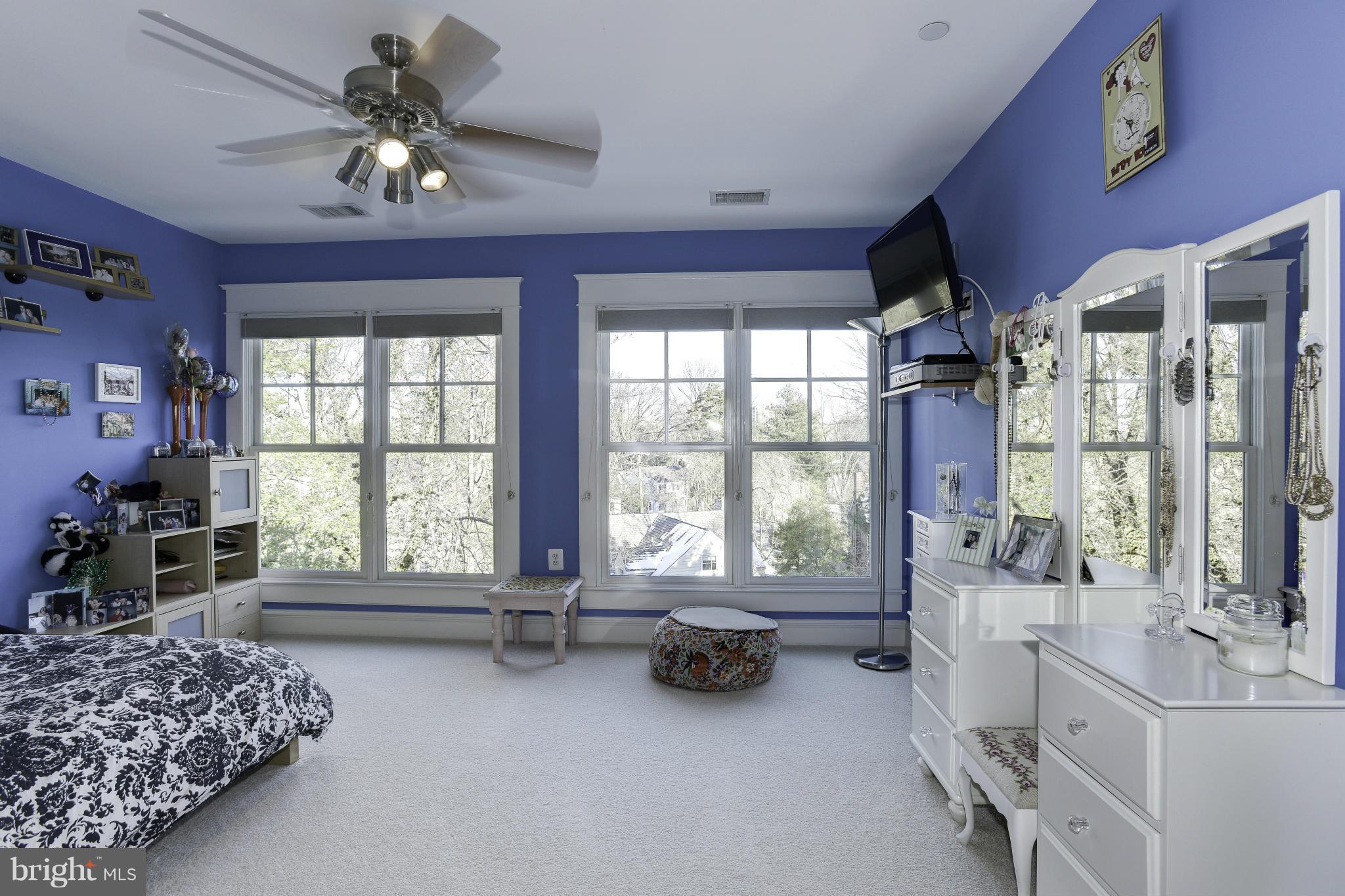 8007 Custer Road Bethesda, MD 20814 - Photo 18 of 25 a living room with furniture and a large window