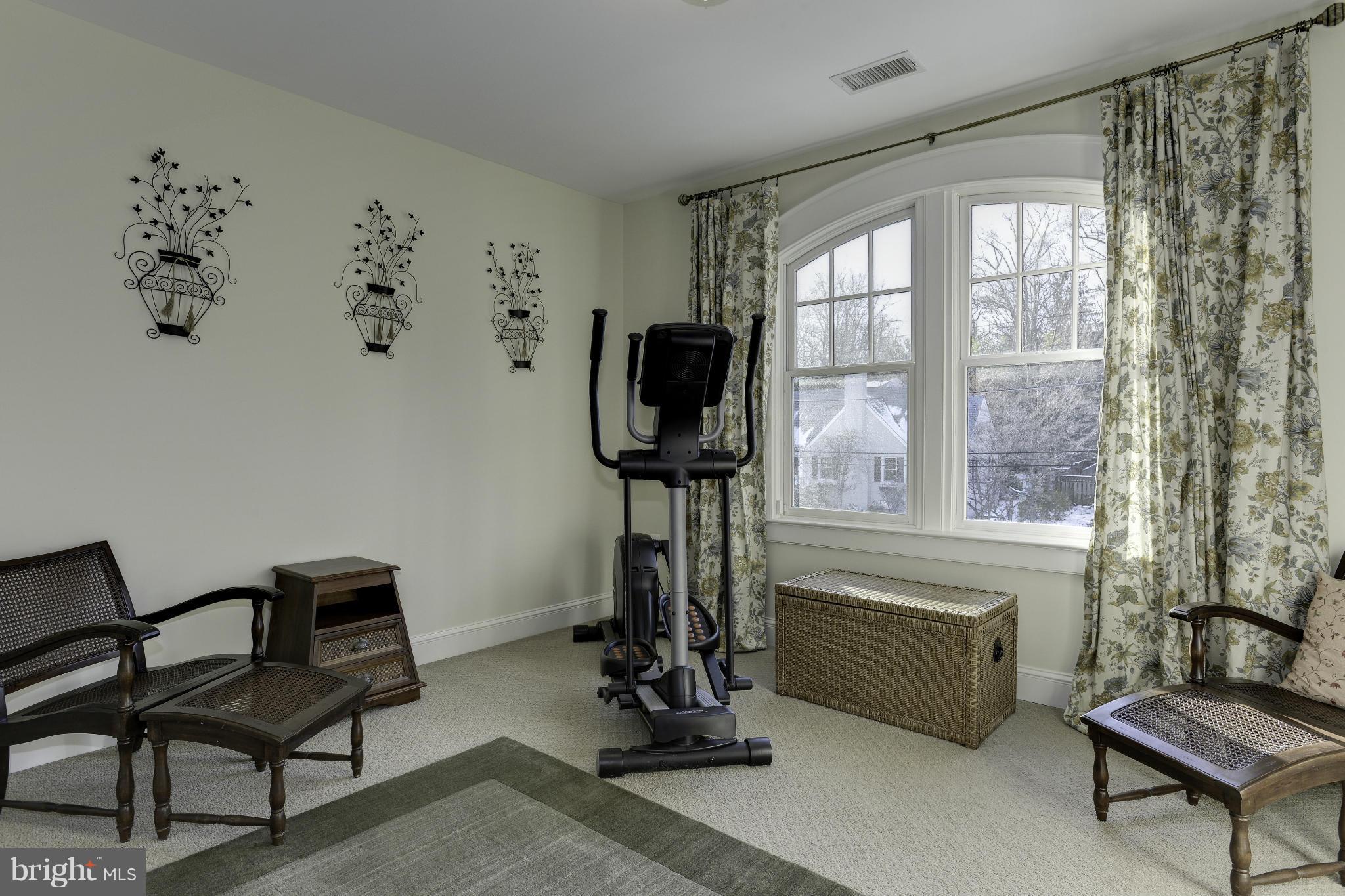 8007 Custer Road Bethesda, MD 20814 - Photo 19 of 25 a view of a livingroom with furniture and a window