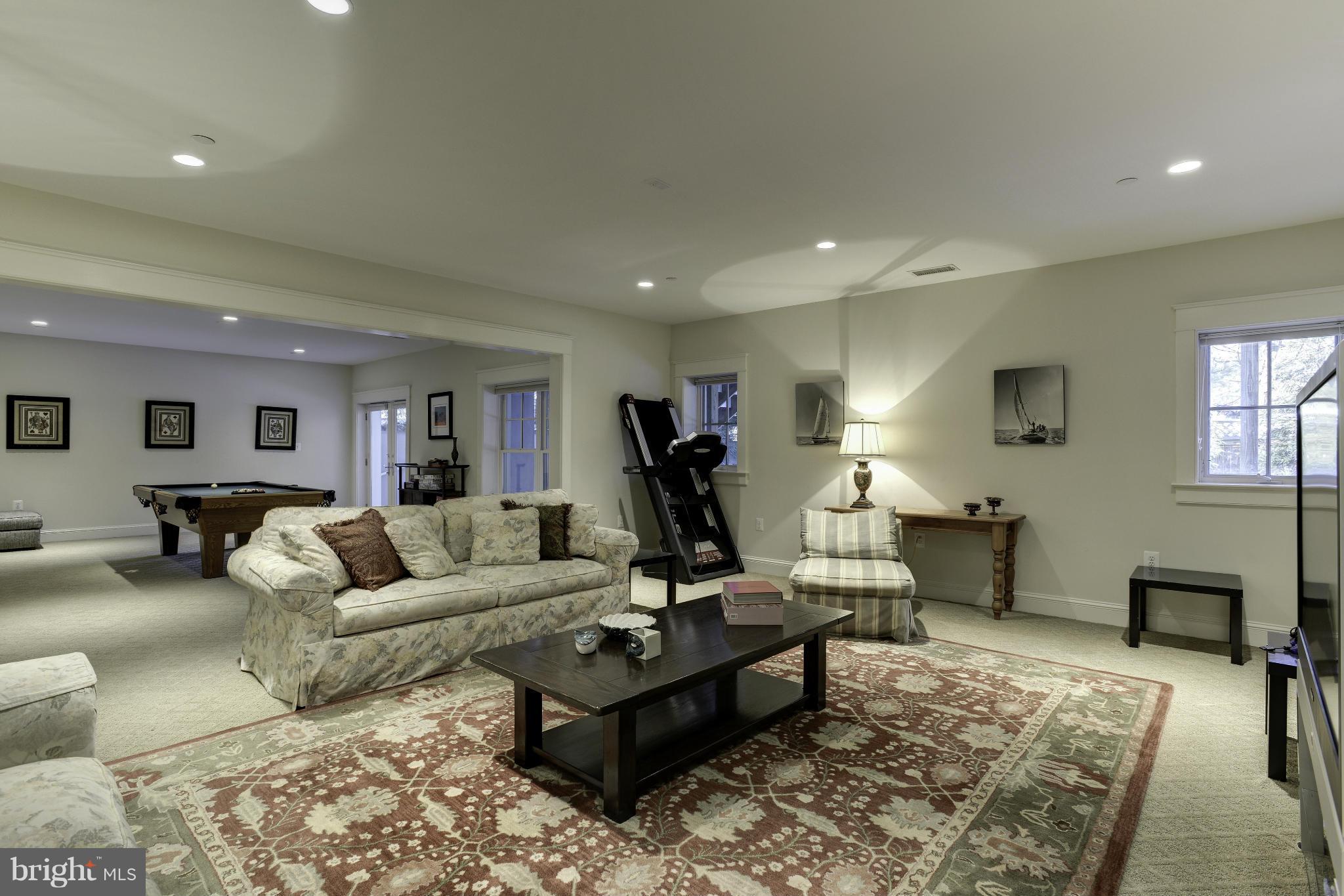 8007 Custer Road Bethesda, MD 20814 - Photo 21 of 25 a living room with furniture rug and window
