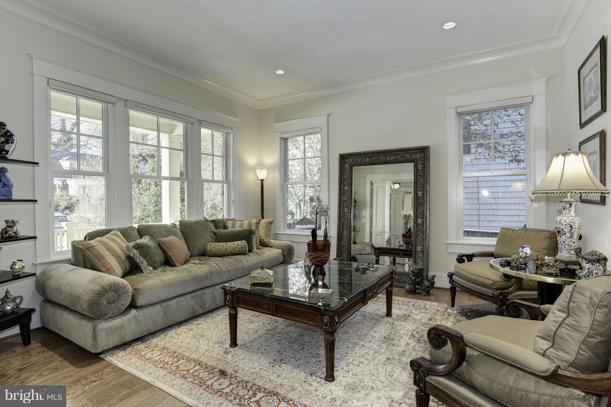 8007 Custer Road Bethesda, MD 20814 - Photo 4 of 25 a living room with furniture and a large window