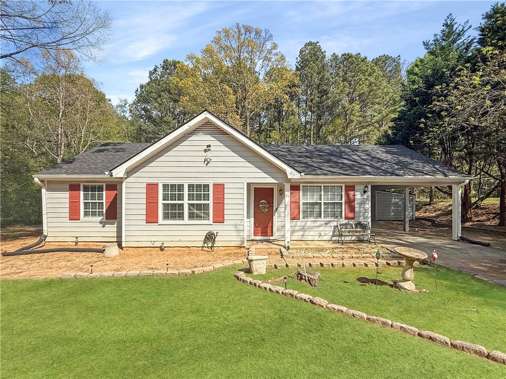 211 Brooks Lane Winder, GA 30680 - Photo 1 of 27 a front view of house with yard and green space