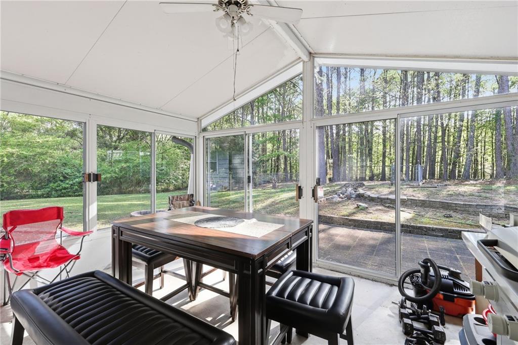 211 Brooks Lane Winder, GA 30680 - Photo 14 of 27 a view of a dining room with furniture window and outside view