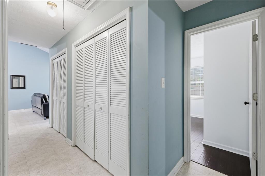 211 Brooks Lane Winder, GA 30680 - Photo 19 of 27 a view of a hallway with closet and a window