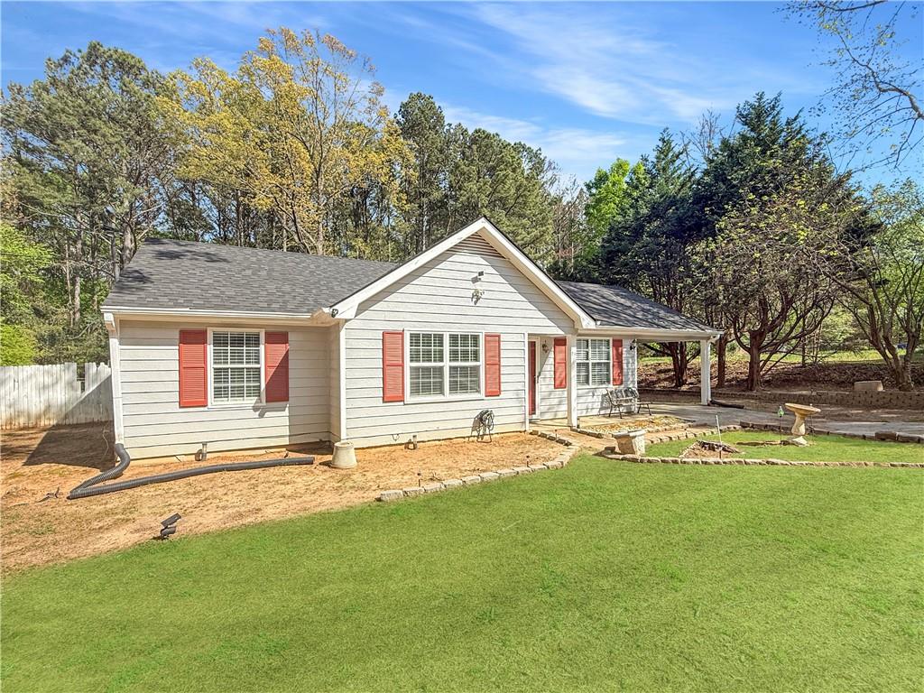 211 Brooks Lane Winder, GA 30680 - Photo 2 of 27 a front view of house with yard and green space