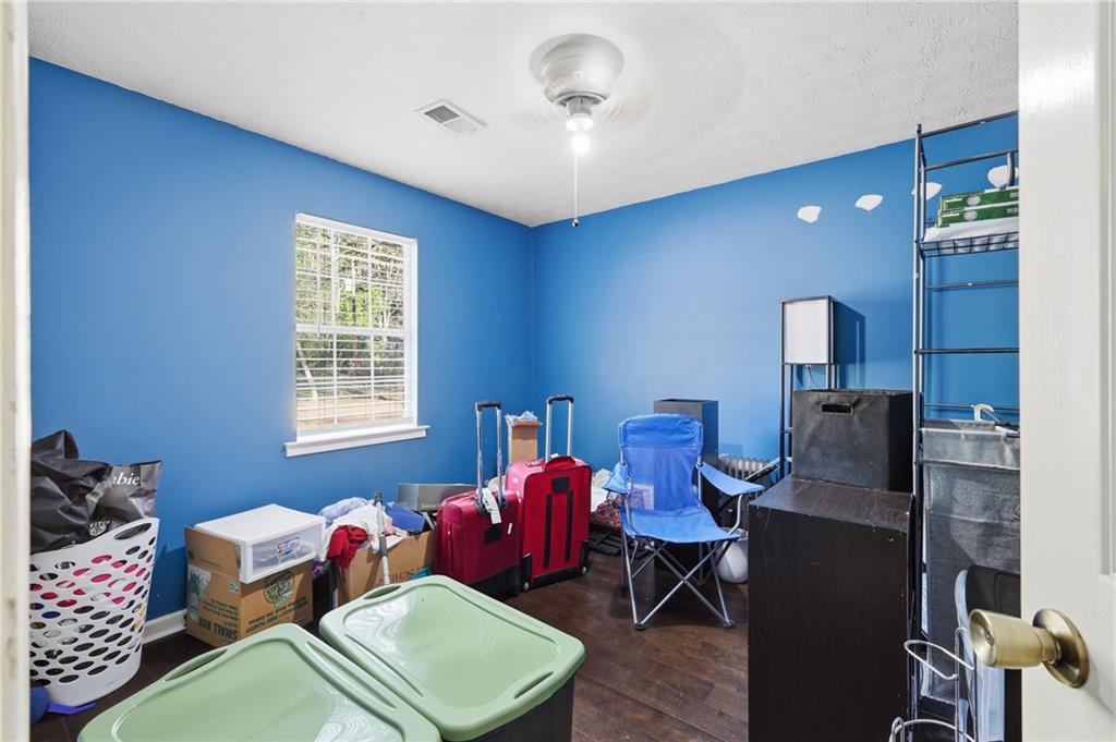211 Brooks Lane Winder, GA 30680 - Photo 23 of 27 a living room with furniture and a window
