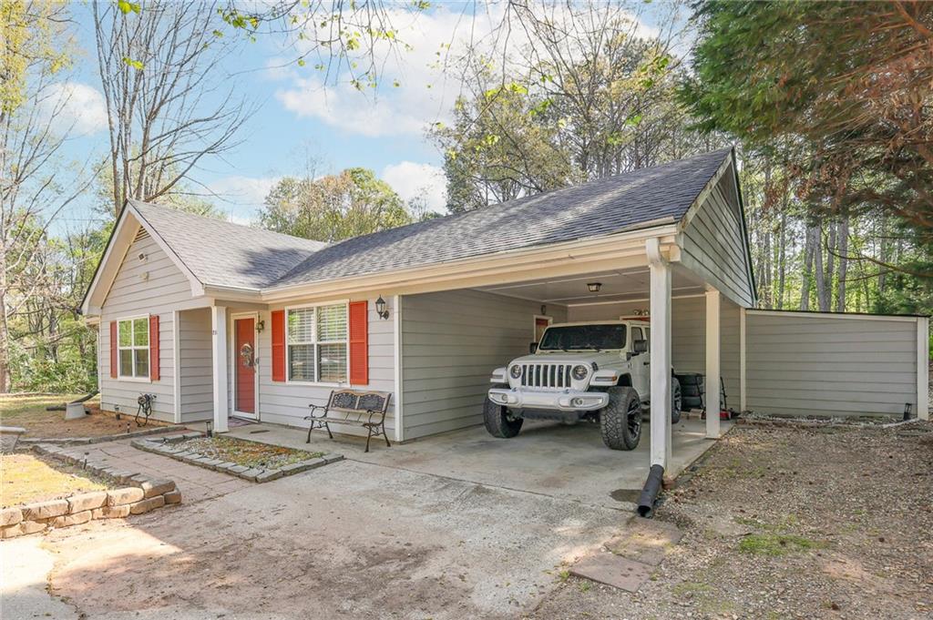 211 Brooks Lane Winder, GA 30680 - Photo 4 of 27 a house view with a outdoor space