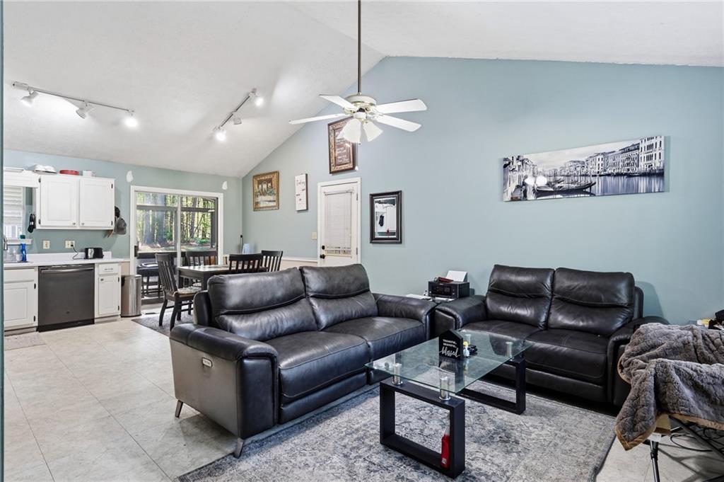 211 Brooks Lane Winder, GA 30680 - Photo 10 of 27 a living room with furniture and kitchen view