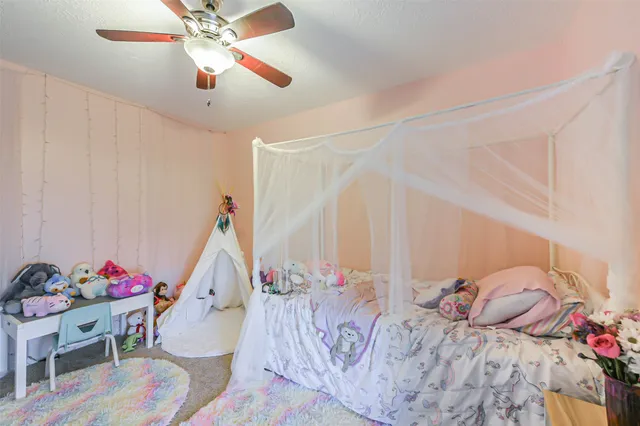 a workspace with furniture and window