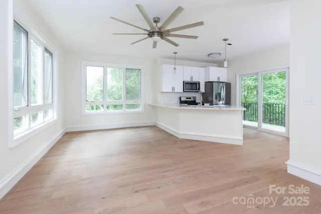 a view of a kitchen with furniture and a fireplace