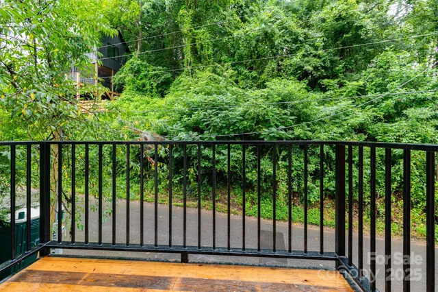 a view of a swimming pool from a balcony