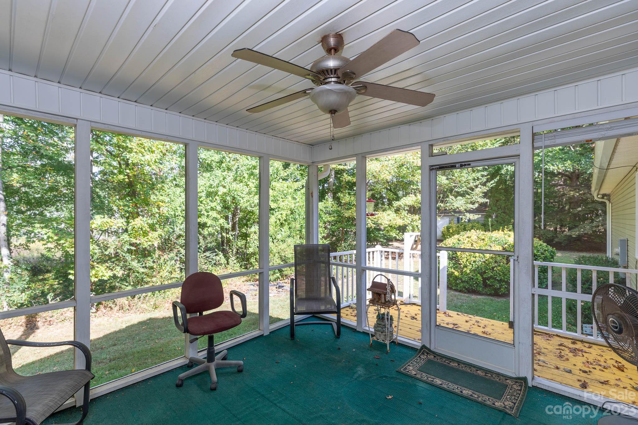 1598 Glenway Road Clover, SC 29710 - Photo 16 of 36 a living room with furniture and a floor to ceiling window