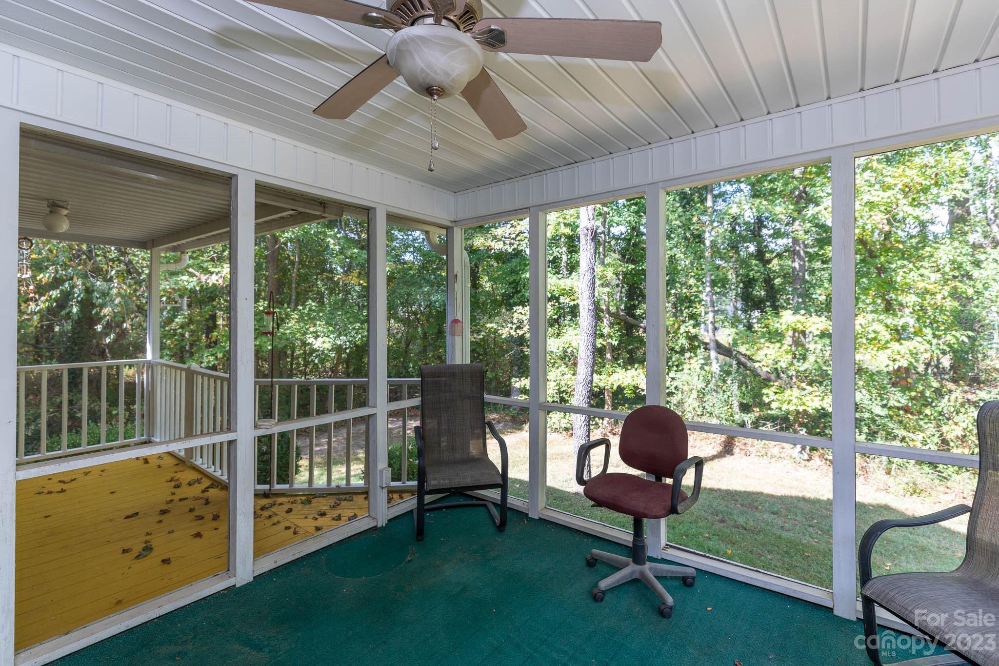 1598 Glenway Road Clover, SC 29710 - Photo 17 of 36 a living room with furniture and a floor to ceiling window