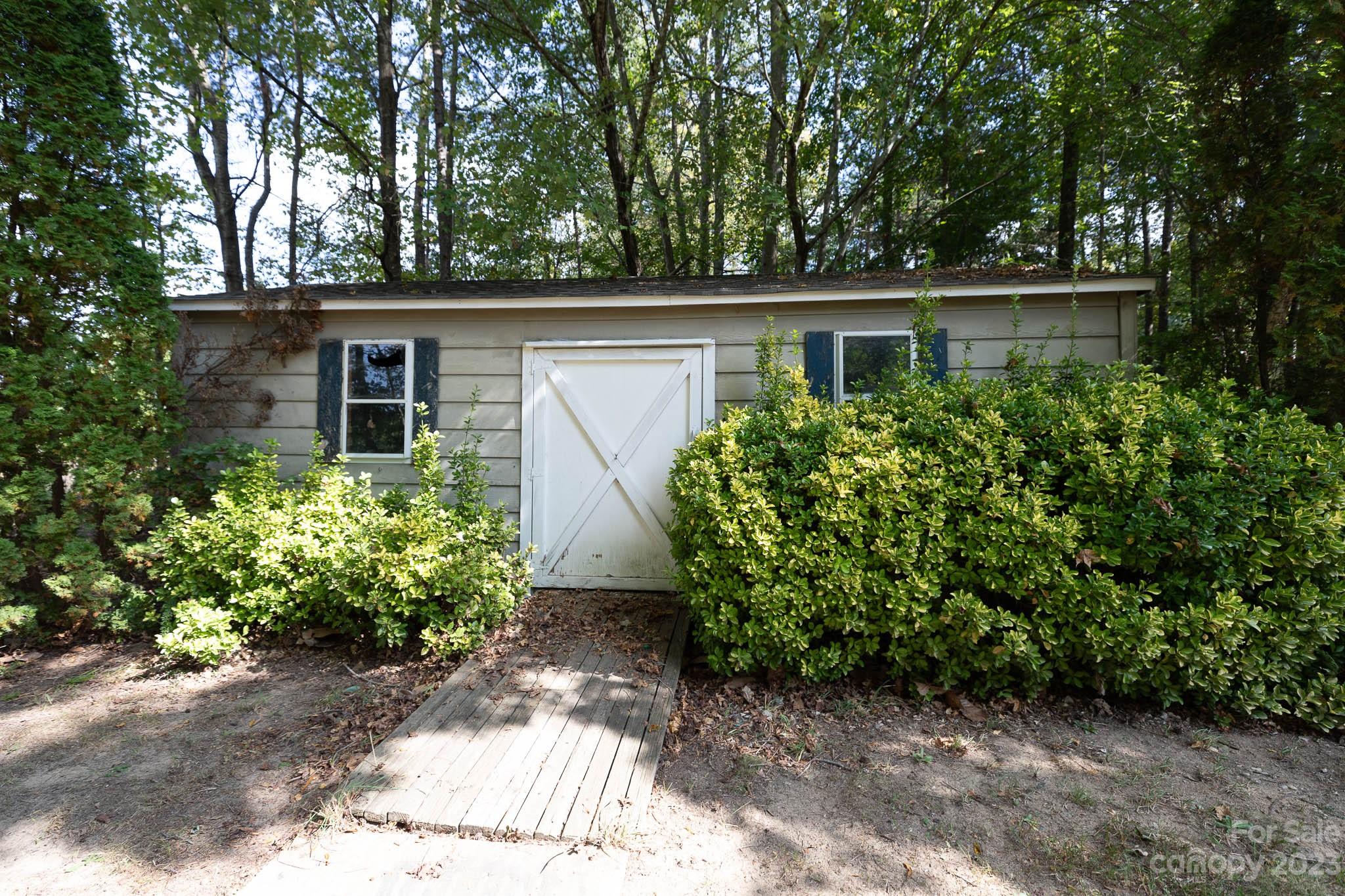 1598 Glenway Road Clover, SC 29710 - Photo 18 of 36 a view of house with a yard