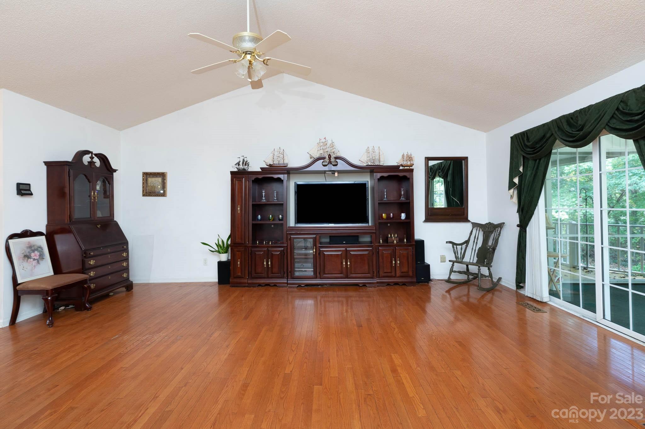 1598 Glenway Road Clover, SC 29710 - Photo 20 of 36 a living room with furniture and a flat screen tv