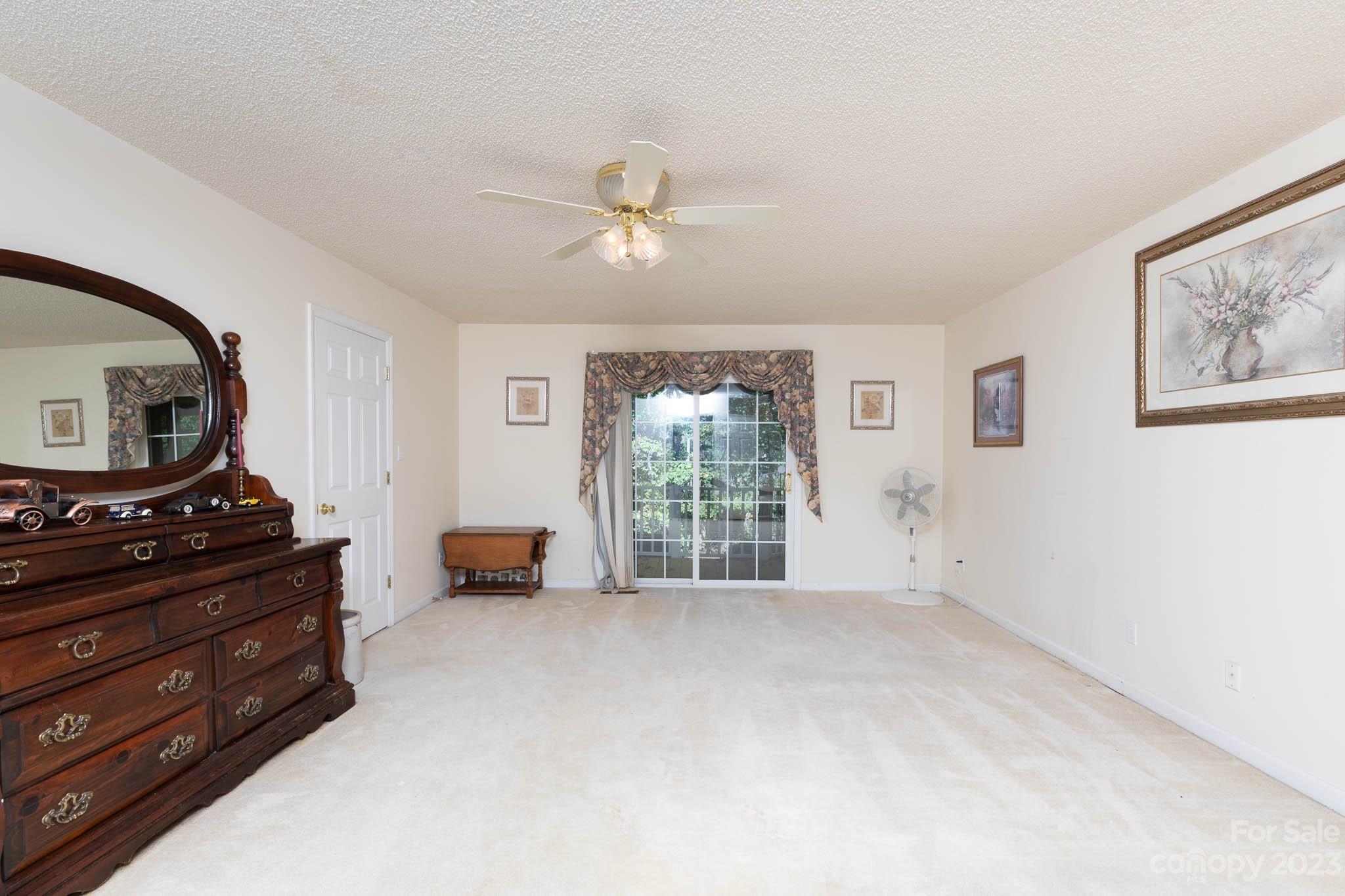 1598 Glenway Road Clover, SC 29710 - Photo 28 of 36 a living room with furniture and a flat screen tv