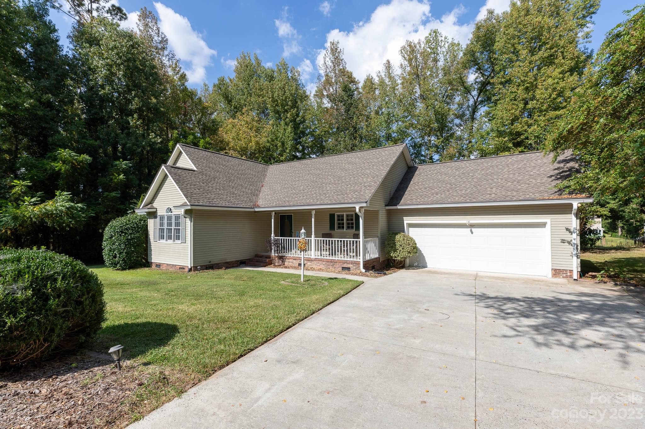 1598 Glenway Road Clover, SC 29710 - Photo 3 of 36 a front view of a house with a yard and garage