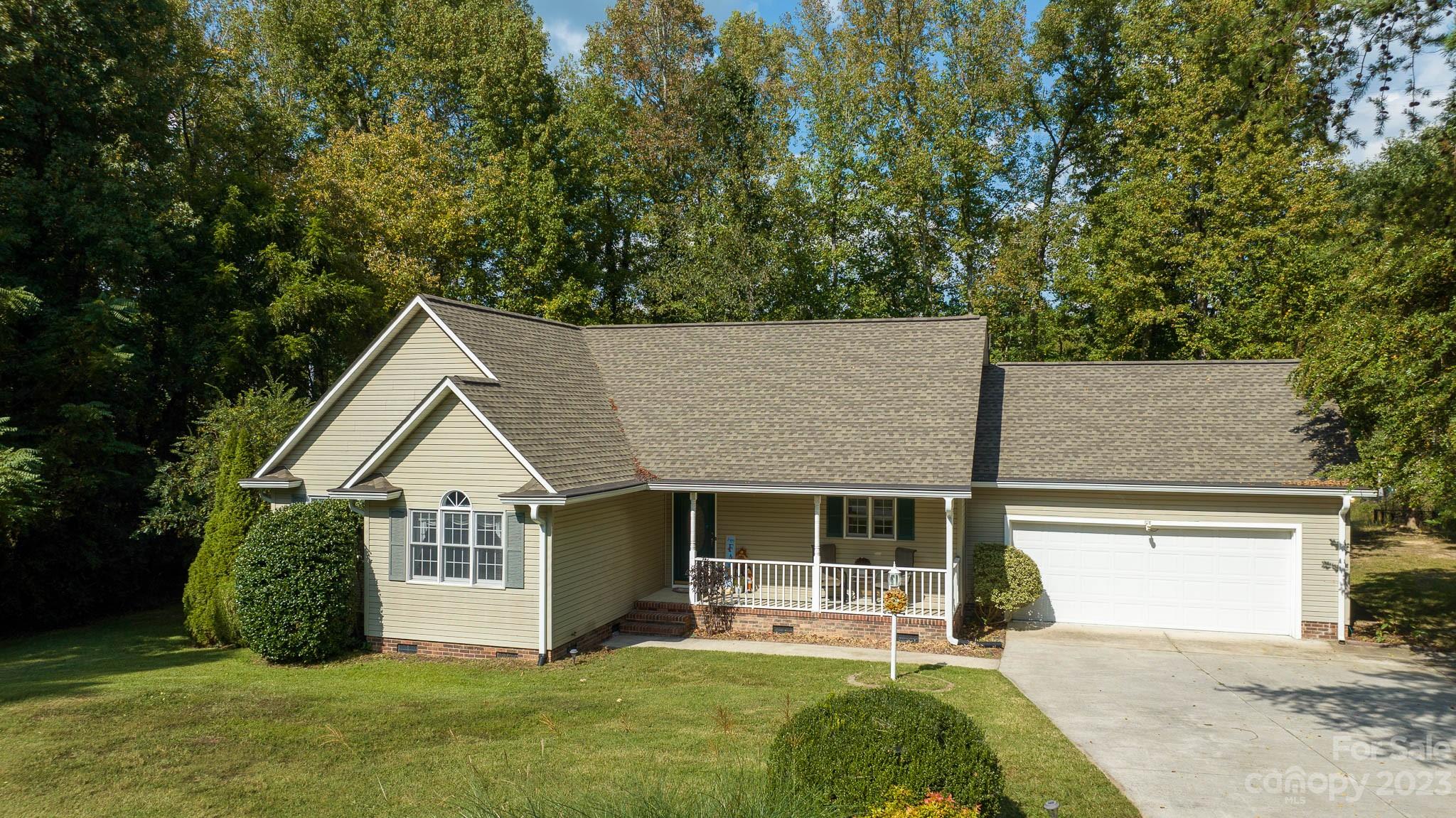 1598 Glenway Road Clover, SC 29710 - Photo 4 of 36 a view of a house with a yard and potted plants