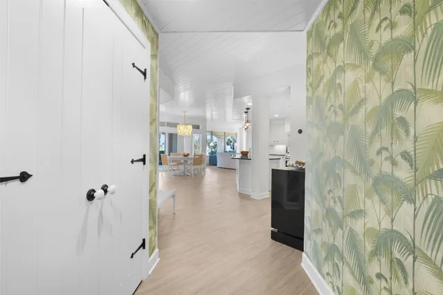 a view of a bathroom with a tub shower and a sink