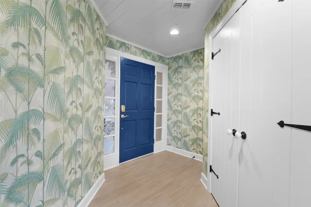 a bathroom with a shower and a sink