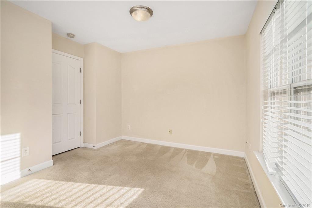 5132 Prosperity Church Road Charlotte, NC 28269 - Photo 19 of 32 a view of an empty room