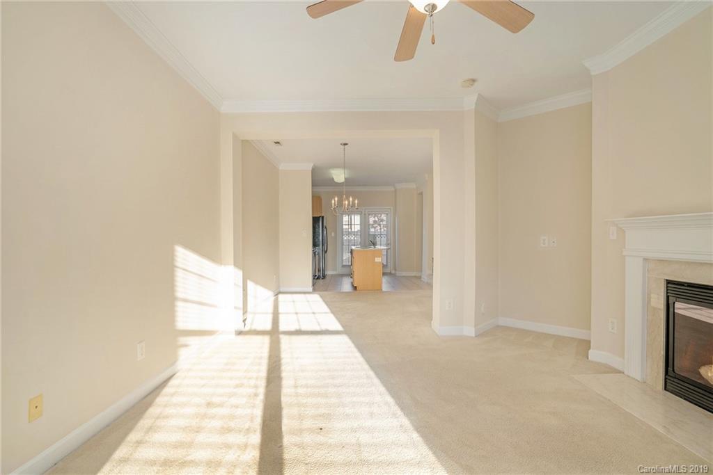 5132 Prosperity Church Road Charlotte, NC 28269 - Photo 4 of 32 a view of a hallway with a white walls