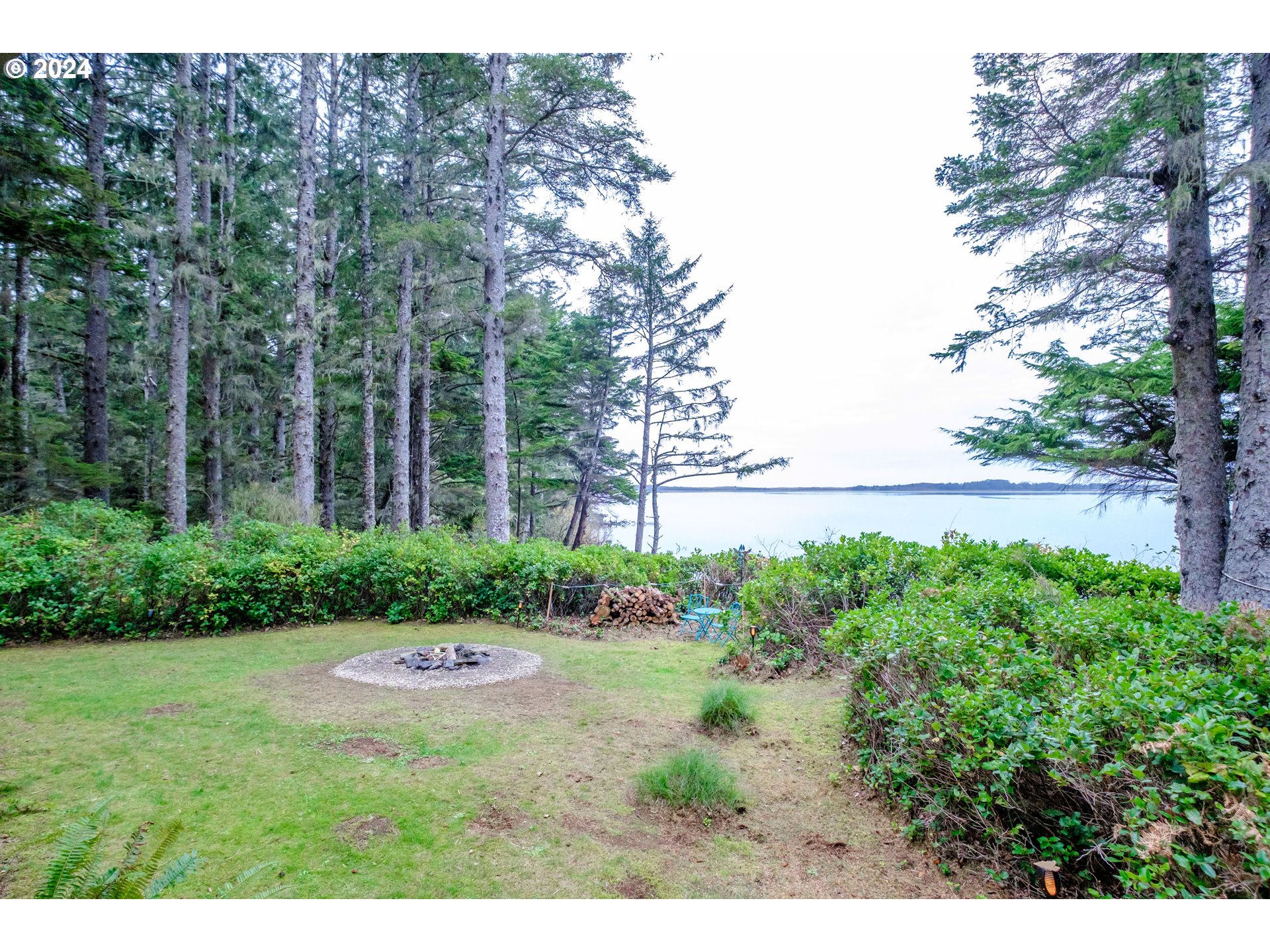 9350 Whiskey Creek Road Tillamook, OR 97141 - Photo 7 of 32 a view of yard with green space