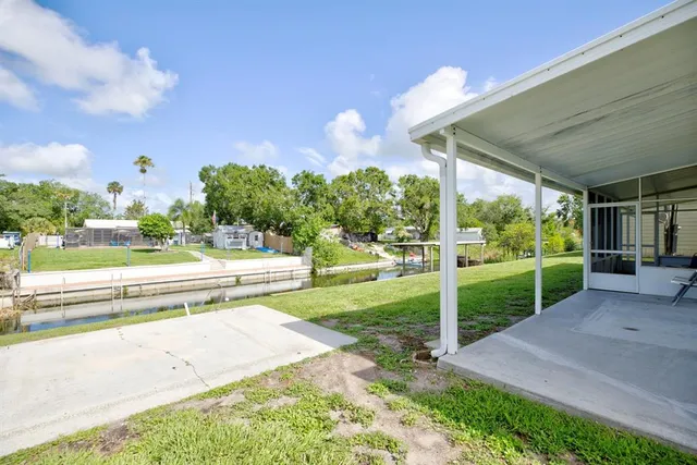 a spacious bathroom with a bathtub and a large window