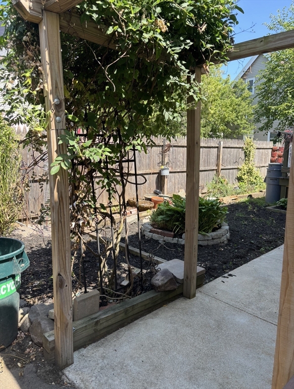 13 Moulton Street Lynn, MA 01905 - Photo 17 of 18 a view of a bench in front of a yard